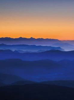 Fototapete DESIGNWALLS 2.0 - blau-orange - Berge - 2,6 Meter